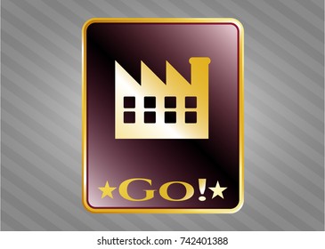  Golden emblem with factory icon and Go! text inside