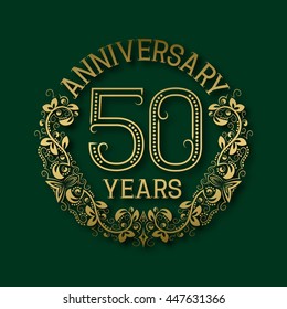 Golden emblem of fiftieth years anniversary. Celebration patterned logotype with shadow on green.
