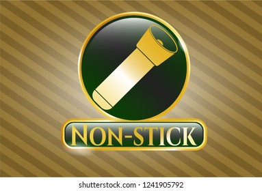 Golden emblem with flashlight icon and Non-stick text inside