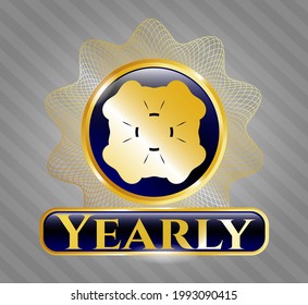 Emblema dorado con cuatro iconos de trébol de hojas y texto anual dentro