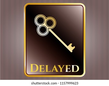  Golden emblem with key icon and Delayed text inside