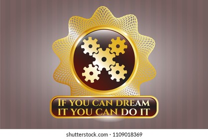   Golden emblem with mechanism icon and If you can dream it you can do it text inside