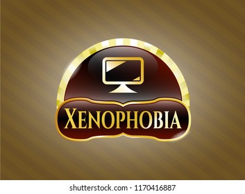  Golden emblem with monitor icon and Xenophobia text inside