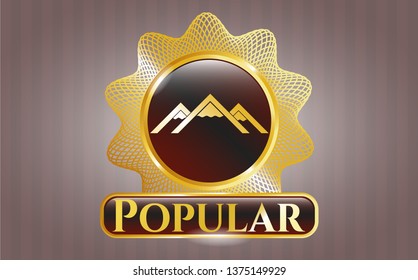  Golden emblem with mountain icon and Popular text inside