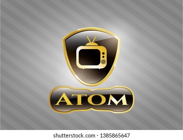  Golden emblem with old tv, television icon and Atom text inside