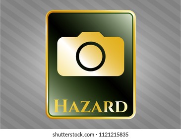  Golden emblem with photo camera icon and Hazard text inside
