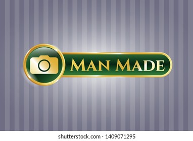 Golden emblem with photo camera icon and Man Made text inside