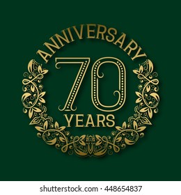 Golden emblem of seventieth years anniversary. Celebration patterned logotype with shadow on green.