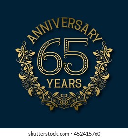 Golden emblem of sixty fifth years anniversary. Celebration patterned logotype with shadow on blue.