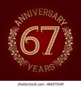 Golden emblem of sixty seventh anniversary. Celebration patterned sign on red.