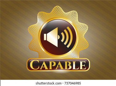  Golden emblem with sound icon and Capable text inside