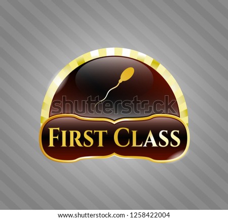  Golden emblem with sperm icon and First Class text inside
