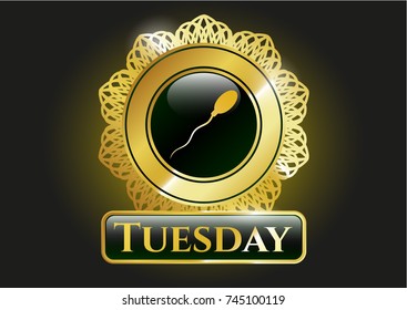  Golden emblem with sperm icon and Tuesday text inside