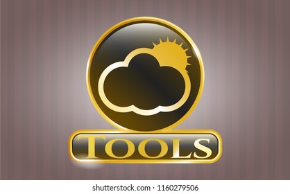  Golden emblem with sun behind cloud icon and Tools text inside