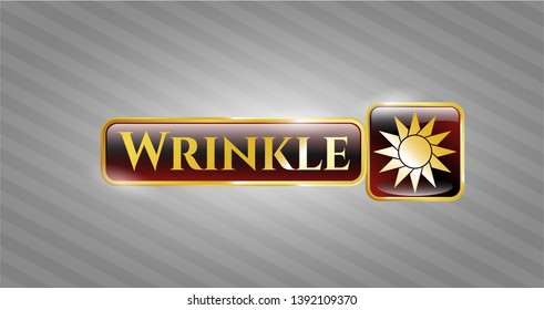  Golden emblem with sun icon and Wrinkle text inside