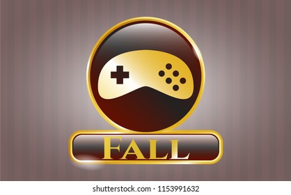  Golden emblem with video game icon and Fall text inside