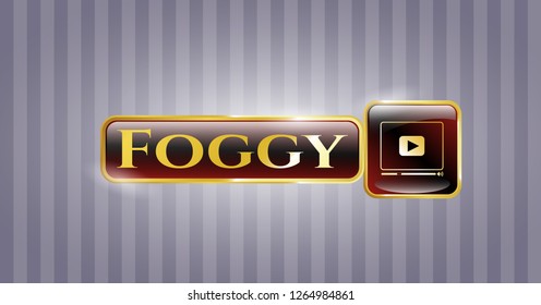  Golden emblem with video player icon and Foggy text inside