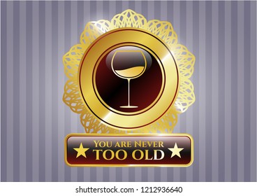  Golden emblem with wine cup icon and You are Never too old text inside