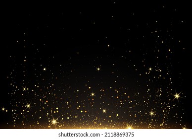 Golden explosion on a black background. Golden glitter particles. Holiday, night club and holiday card.