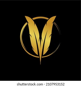 golden feathers in the shape of the letter M