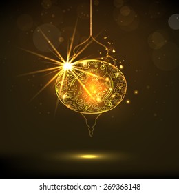 Golden floral design decorated hanging arabic lamp for holy month of muslim community Ramadan Kareem celebration.