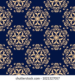 Golden floral element on dark blue background. Seamless pattern for textile and wallpapers