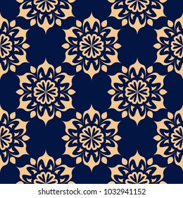 Golden floral element on dark blue background. Seamless pattern for textile and wallpapers