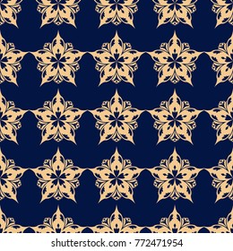 Golden floral element on dark blue background. Seamless pattern for textile and wallpapers