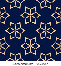 Golden floral element on dark blue background. Seamless pattern for textile and wallpapers