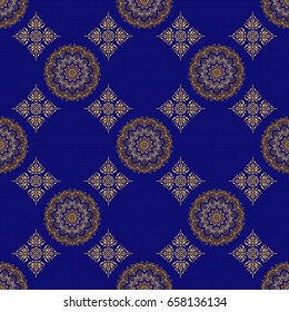 Golden floral motif on a blue background. Vector glitter textured seamless pattern with golden elements and ornaments. Perfect for holidays.