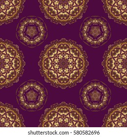Golden floral motif on a purple background. Vector glitter textured seamless pattern with golden elements and ornaments. Perfect for holidays.