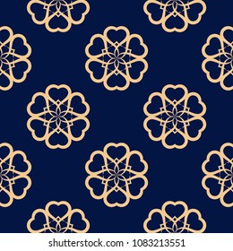 Golden floral ornament on dark blue background. Seamless pattern for textile and wallpapers