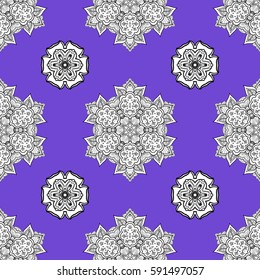 Golden floral seamless pattern. Damask background. Gold floral ornament in baroque style. Golden element on a violet background.