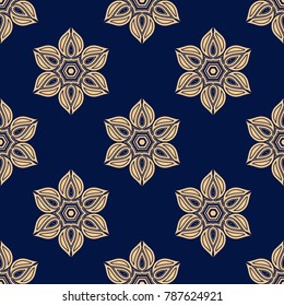 Golden floral seamless pattern on blue background