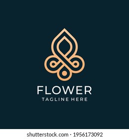Golden flower ornament monogram logo design vector concept for yoga spa. Logo can be used for icon, brand, identity, decoration, zen, fashion, and business company