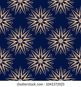 Golden flowers on blue background. Seamless pattern for textile and wallpapers