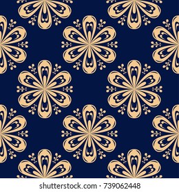 Golden flowers on blue background. Seamless pattern for textile and wallpapers