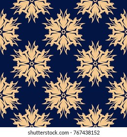 Golden flowers on blue background. Seamless pattern for textile and wallpapers