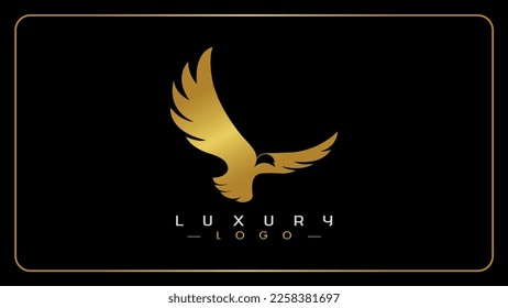 Golden flying eagle hawk luxury logo design, Isolated gold color eagle logo for brand identity, Elegant eagle monogram icon vector illustration.