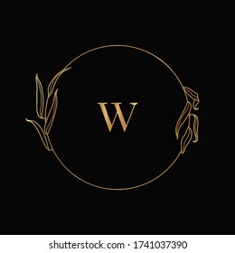 Golden frame of willow branches. Round icon in a trendy minimalistic linear style. Vector logo with the letter W and a twig . Template for cosmetics logo, beauty Studio, hair salon, handmade, spa