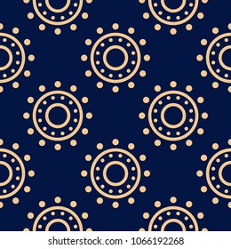 Golden geometric ornament on blue background. Seamless pattern for web, textile and wallpapers