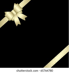 Golden gift ribbon and bow isolated on black(also available jpg version)