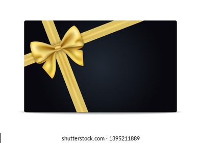 Golden gift ribbon and bow on black gift card.
