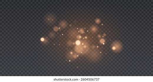 Golden glitter particles with bokeh effect and soft shimmering glitter glow on a transparent background.