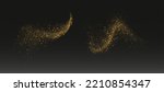 Golden glitter splashes, shiny star dust explosion, shimmer spray effect, festive holiday particles isolated on a dark background. Vector illustration.