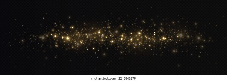 Golden glitter.Light effect.Glittering particles background. Gold dust on a transparent background.