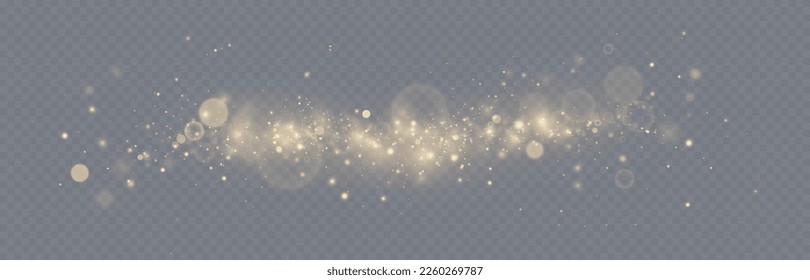 Golden glitter.Light effect.Glittering particles background. Gold dust on a transparent background.