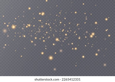 Golden glitter.Light effect.Glittering particles background. Gold dust on a transparent background.