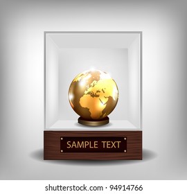 Golden globe in exhibition glass spot