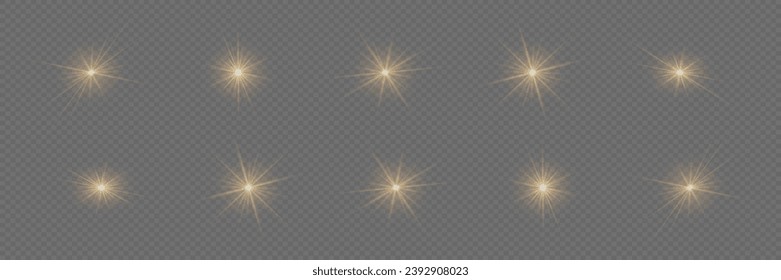 Golden glowing light explodes on a transparent background. A set of sparkling magical dust particles. Bright Star. Transparent sun, bright flash. Vector sparkles.	
